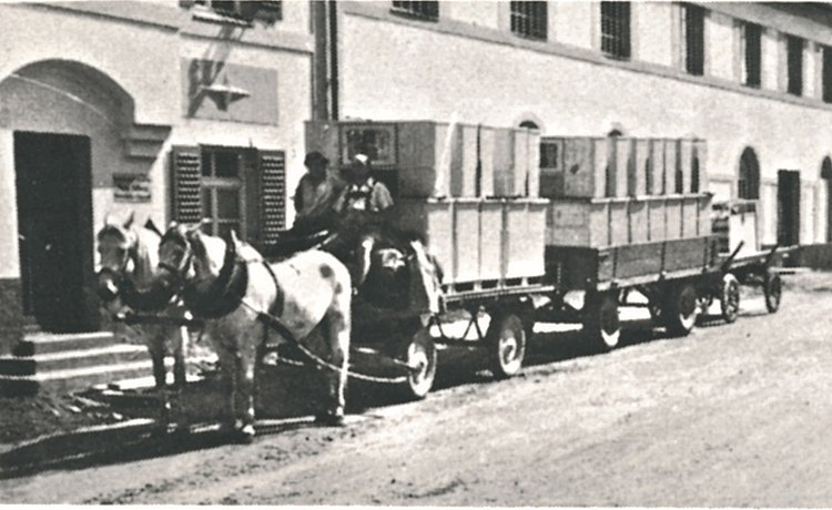 1951: Horse-drawn carriage delivers packaged kitchen sideboards in crates