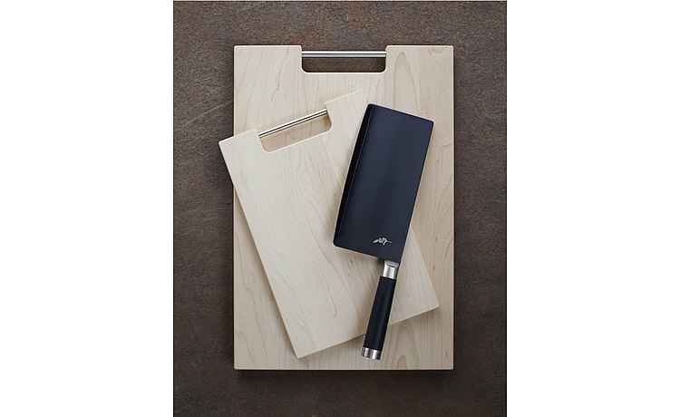 Maple chopping board in various sizes with practical metal handle