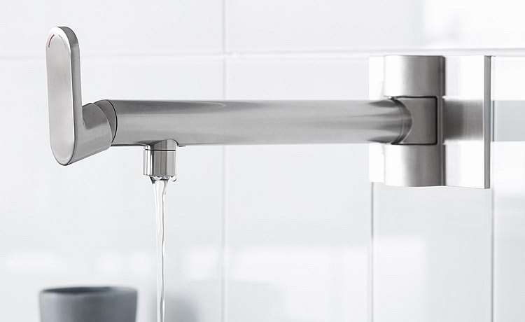 Wall-mounted faucet. Link: Shape and space for ideal storage and preparation of dishes